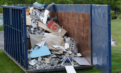 Recycling center processing cleared household items